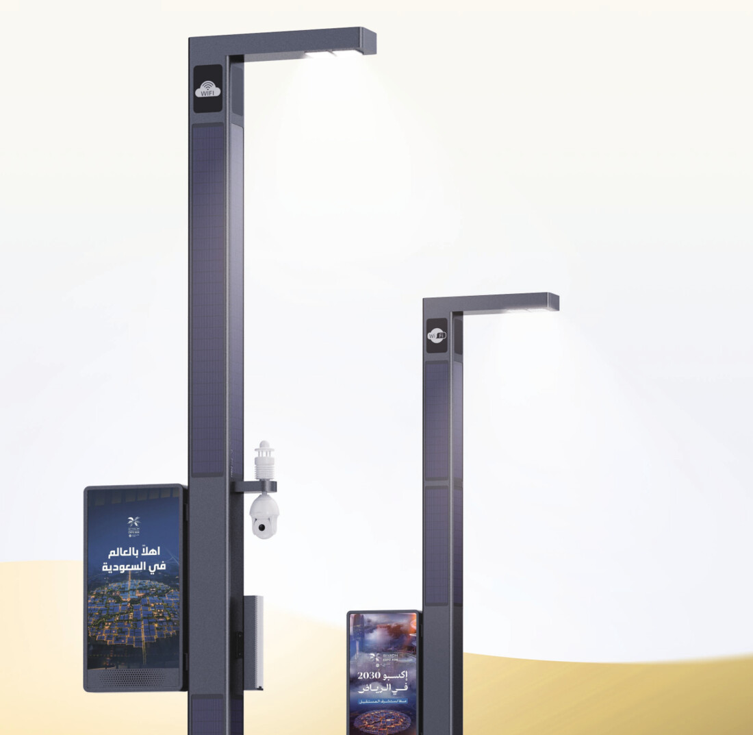 Two smart solar poles featuring LED advertising screens and a pan-tilt surveillance camera